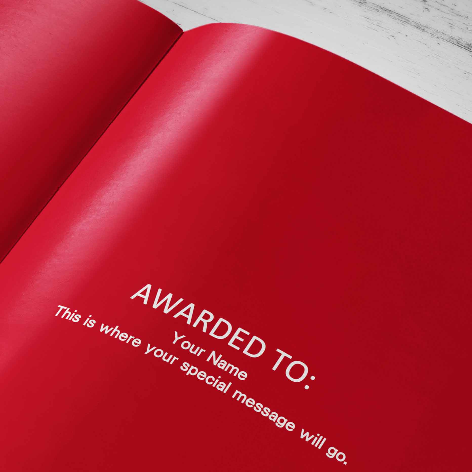 Personalised message page inside the storybook reading Awarded To Your Name, with space for a personal message